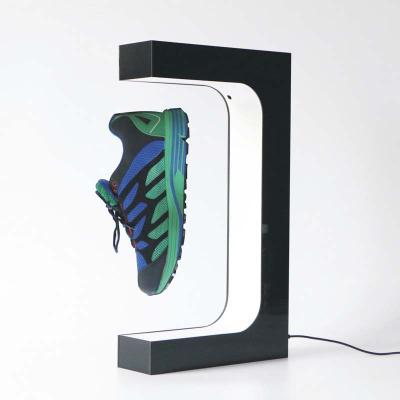 China Newest Design Durable Fashion Awesome LED Lighting Rotating Magnetic Sneaker Floating Display Racks for sale