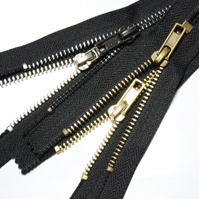 China Automatic lock brass zippers narrow end China factory price with gold&sliver teeth automatic lock for bags&garment for sale