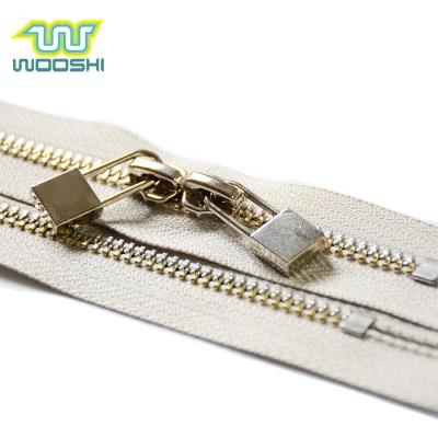 China Two Way Automatic Lock Two Color Y Teeth Gold Metal Zipper Slider End-end For Eco-friendly Handbags Zipper for sale