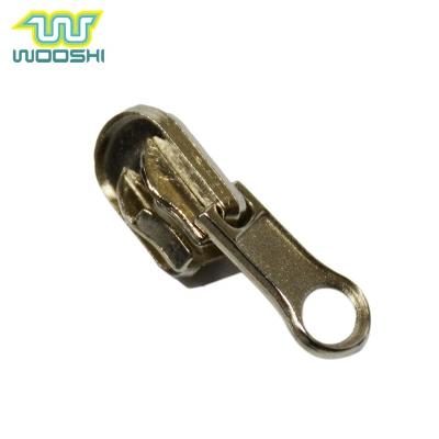 China Different Weight Rotary Pull Metal Automatic Head Zipper Slider Nickel Free For Fashion Coats for sale