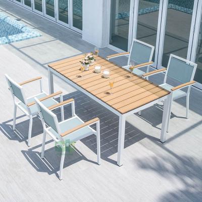 China Restaurant (E1101) Eco-friendly White Aluminum Metal Outdoor Dining Table and Chair Set for sale