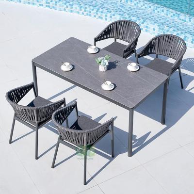 China (E7063+9935) Nordic Eco-friendly Outdoor Stackable Woven Chairs And Dining Table Furniture Set for sale