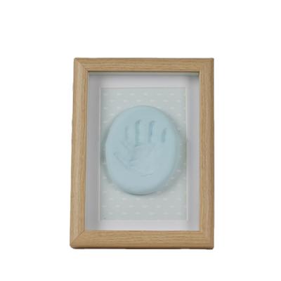 China Classic Baby Custom Design From Jinn Home Little Baby Clay Footprint Handprint Kit Picture Frame Non Toxic for sale