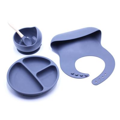 China Eco-Friendly Sustainable Baby Silicone Bibs Plate Suction Cup With Spoon Set Easy To Clean Toddler Dinner Set Of 4 for sale