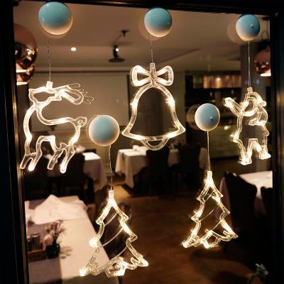 China Christmas Light Wholesale Christmas Decoration Waterproof Outdoor Sucker Type Lights Stick To Window Door for sale