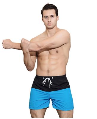 China Breathable Men Slim Quick Dry Drawstring Contrast Color Shorts Casual Panel Beach Sports Shorts Men Swimming Shorts for sale