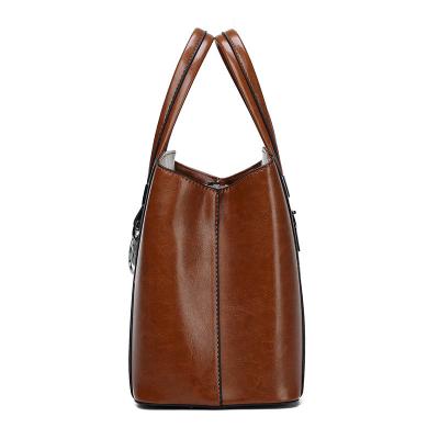 China New waterproof oil wax leather European and American fashion soft leather hand-held cross women's bag shoulder bag large - body for sale