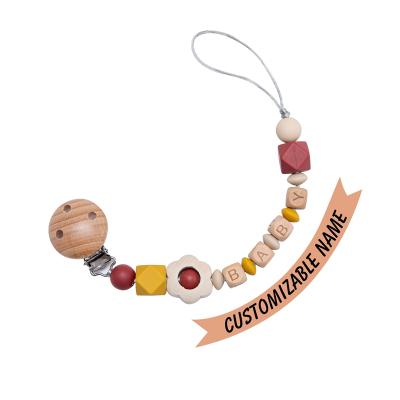 China BPA Free Baby Pacifier Chain Hook Beads Custom Name Pacifier Clip Flower Wooden Pacifier Chain Wholesale for sale