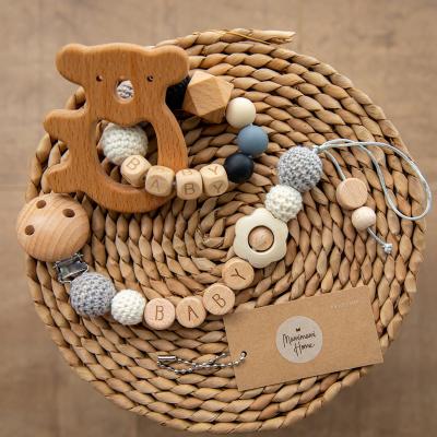 China eco-friendly & Wholesale Wooden Ring Wooden Beads Crochet Beads BPA Baby Teether Pacifier Chain Bracelet Two Piece Free Baby Teething for sale