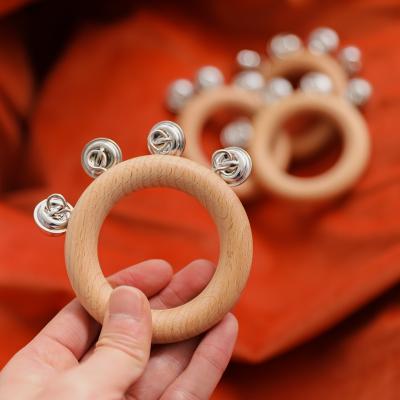 China Natural Eco-Friendly Baby Teething Ring Organic Beech Wood Teeth Ring With Bell Wooden Teether Wholesale for sale