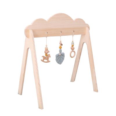 China Clouds Exercise Newborn Bell Frame Pure Wooden Material Teether Crib Decoration for sale