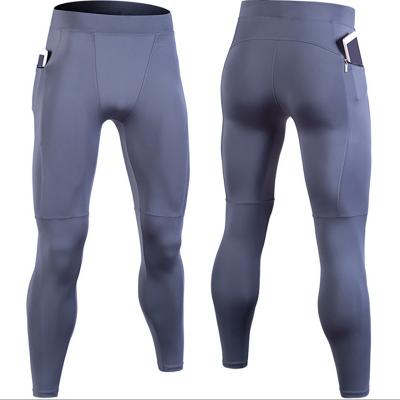 China Viable High Quality Elastic Mens Activewear Training Pants Polyester Gaiters Quick Dry 100% Breathable Tights With Pockets for sale