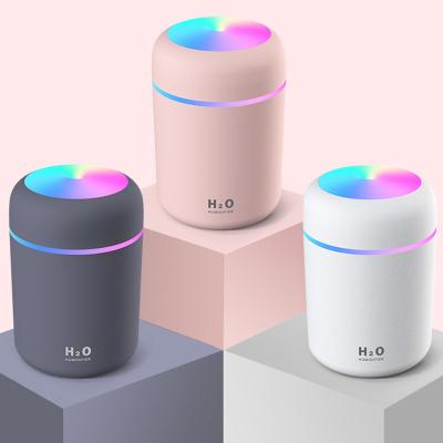 China Feel Comfortable LED Glow Mini 300ml H2O Lightweight Portable Aroma Essential Oil Diffuser Car Diffuser Dual USB Car Air Humidifier Mist Humidifier for sale