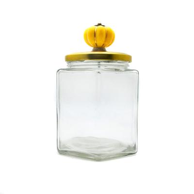 China No Food Jar Food Storage Hexagonal Glass Jar With Cute Pumpkin And Metal Lip Hexagon Glass Jar for sale