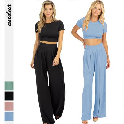 China Breathable Casual Solid Crewneck Short Sleeve Crop Top Wide Leg Pants 2 Piece Set Women Summer for sale