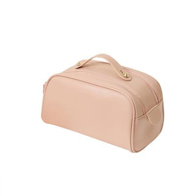 China Portable Waterproof PU Leather Skin Care Bag Large Capacity Travel Toiletry Bag Double Zipper Durable Custom Cosmetic Bag Makeup Bag for sale