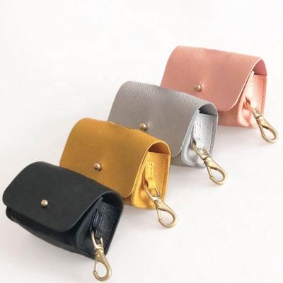 China Stored Customized Interesting Performance Pet Poo Bag Holder Poop Bag Holder Leather Pet Accessories for sale