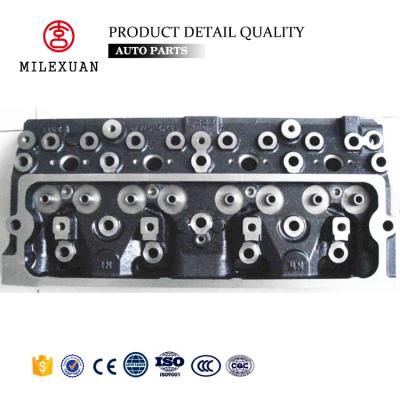 China Milexuan auto parts 3cx 4cx buy diesel engine cylinder head 4 valve sale for JCB standard for sale