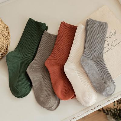 China QUICK DRY high quality soft cotton kids girls solid color breathable kid tube sock socks for sale for sale