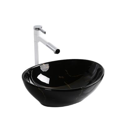 China Modern Unique Design Black Countertop Wash Sink Bathroom Sink Marble Ceramic Sink for sale