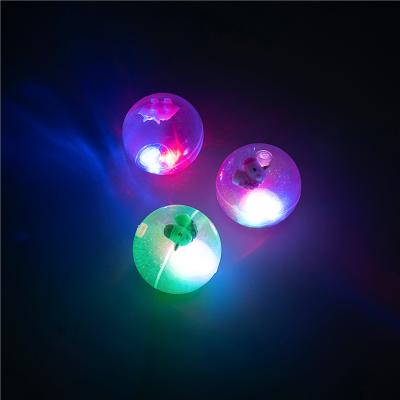 China 6.5cm Flashing TPU Crystal Ball Toys Light Up Dynamic Floating Bouncy Ball Toy Glitter Floater Water Bouncing Snow Sand Bling for sale