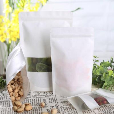 China Disposable White Kraft Paper Stand Up Bag Food Packaging Zip Lock Bags With Windows for sale