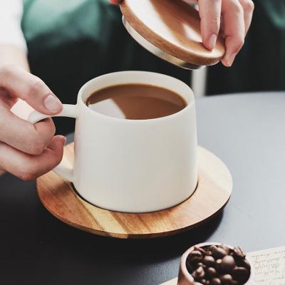 China Viable The Latest Design Matte Handmade Porcelain Coffee Cup Saucer White Ceramic Cup With Bamboo Lid for sale