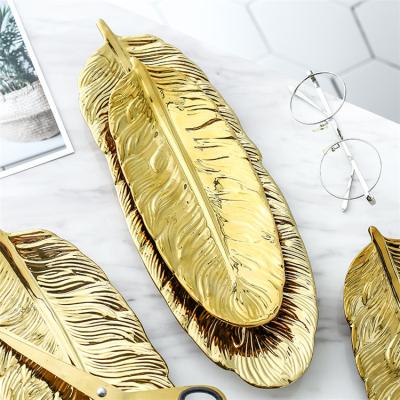 China Modern Feather Shape Gold Plating Ceramic Decorative Dishes Custom Jewelry Tray For Wedding for sale