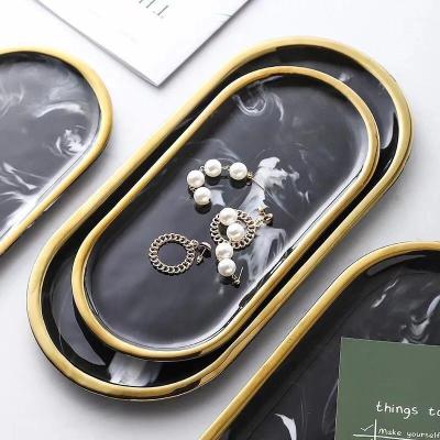 China Sustainable European Style Hand Painting Oval Black Marble Dessert Steak Charger Plates Ceramic Dinner Dishes for sale