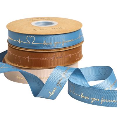 China High tenacity printing yarn ribbon gift box packaging custom tan Christmas apparel bow ribbon for sale