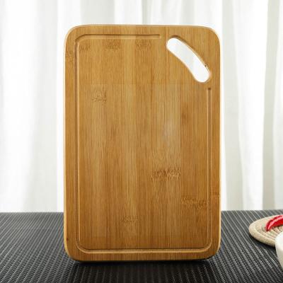 China Sustainable New Design Eco - Friendly Bamboo With Cutout Handle Wood Countertop Chopper for sale