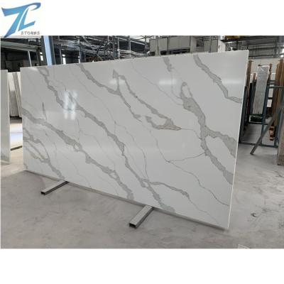 China 2022 2cm Modern Popular Golden Engineered Quartz Slab Calacatta Stone For Wall And Flooring Decoration for sale