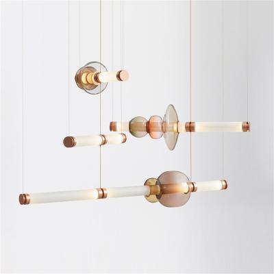 China Factory Modern Custom Glass Guzhen Pendant Lamp,Brass Color Art Chandelier for Hotel Lobby Villa Corridor for sale