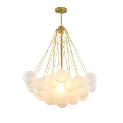 China Factory Modern Custom Glass Guzhen Pendant Lamp,Brass Color Art Chandelier for Hotel Lobby Villa Corridor for sale