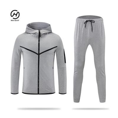 China Breathable Custom Design Your Own Logo Tracksuit Plain Polyester Fabric Sublimation Sportswear Slim Fit Men's Unisex Tracksuits for sale