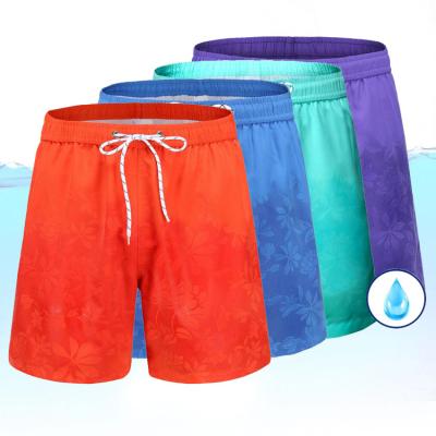 China Wholesale Men's Breathable Water Reactive Magic Printing Beach Swimming Shorts Swim Trunks For Men for sale