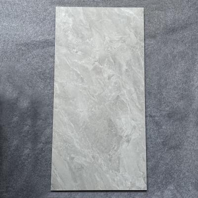 China Modern Beige Solid Vitrified Glazed Ground Porcelain Floor Tile Full Polished Marble Floor And Wall Tiles 600x1200mm for sale