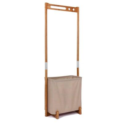 China Sustainable Bamboo Free Standing Shelf Clothes Rack With Storage Bag for sale