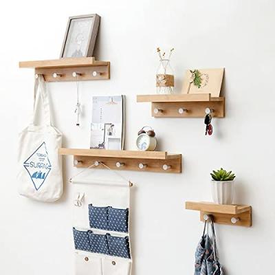 China New Classic/Postmodern Bamboo Shelf Hanging Shelf Wood Wall Shelf Organizer with Hooks for sale