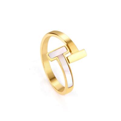 China Fashion Trendy T Shaped White Shell Dubai 18k Gold Stainless Steel Jewelry Designer Ring For Women for sale