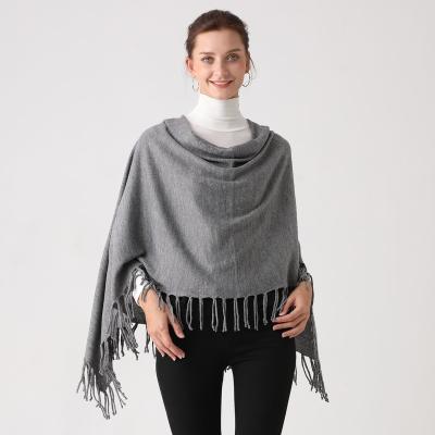 China Anti-Wrinkle Women Knitted Poncho Fringed Edge Knitwear Acrylic for sale