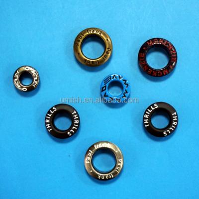 China Different size nickel free enamel brass metal eyelet with color logo for garment for sale