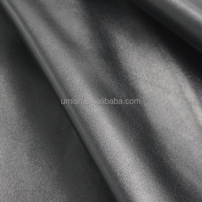 China ECO-FRIENDLY BLACK ELASTIC PU WATER BASED SYNTHETIC LEATHER elastic FOR PANTS for sale