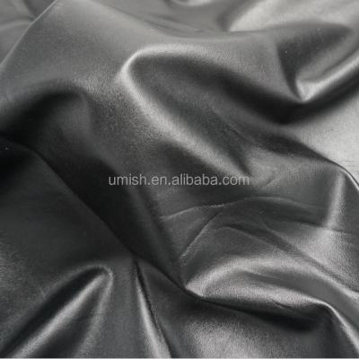 China ELASTIC GLOSS BLACK PU SOFT ELASTIC LEATHER FOR PANTS for sale