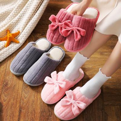 China Fashion Trend Multi Color Fur Slippers Couples Fashion Bow Cotton To Trail Fur Warm Soft Plush Casual Ladies Slipper for sale