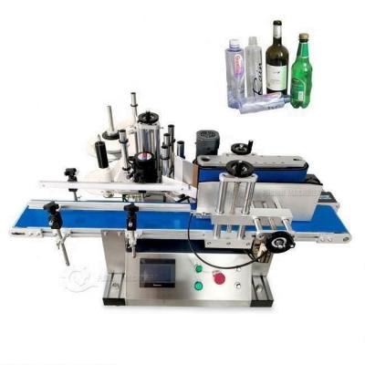 China Food 3 Roll Round Bottle Stickers Desktop Automatic Positioning Labeling Machine For Food Beverage for sale