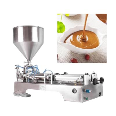 China Beverage Horizontal Type Quantitative Smart Manual Automatic Bee Honey Filling Machine For Paste for sale