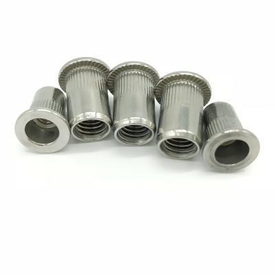 China Water Treatment Carbon steel zinc plated countersunk din7340 tubular clutch rivet nuts flat blind rivet nut for sale