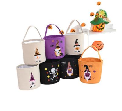 China 2022 New Amazon Candy Cartoon Halloween Props Decorative Pumpkin Candy Barrel Children's Hand Basket for sale