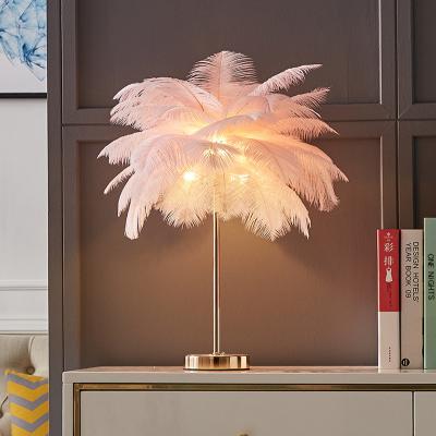 China Amazon feather tree lamp ostrich feather table bedside lamps nordic modern hot sale feather table lamp for wedding for sale